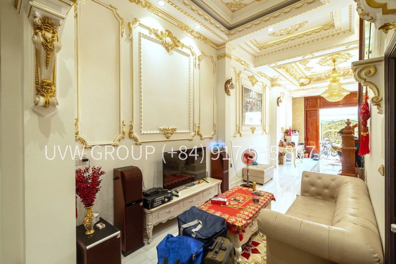 Luxury house for sale on Ben Phu Lam Street, District 6, with gold interiors and private pool