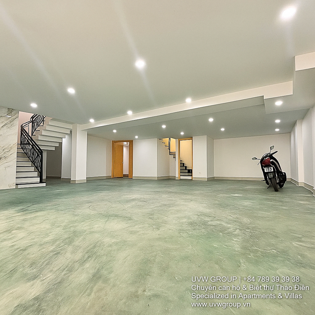 Front view of a modern office house for rent in Song Hanh, An Phu Ward, District 2, featuring 4 floors, large yard, basement, and elevator – ideal for office or business use.