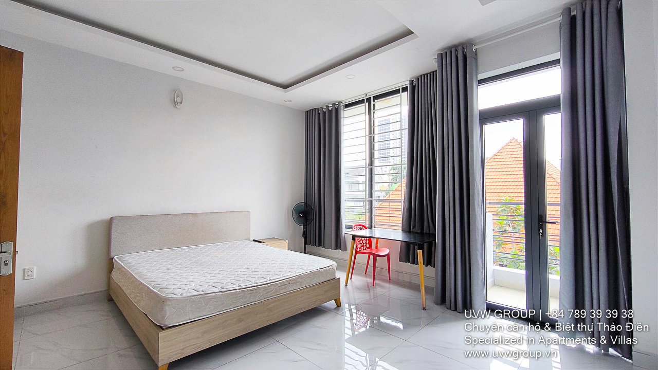 4BR, 4BA house for rent near Thai Ly Street, Thao Dien. 5x20m, 3 levels + attic, Northeast-facing. Rent: 45 million/month.