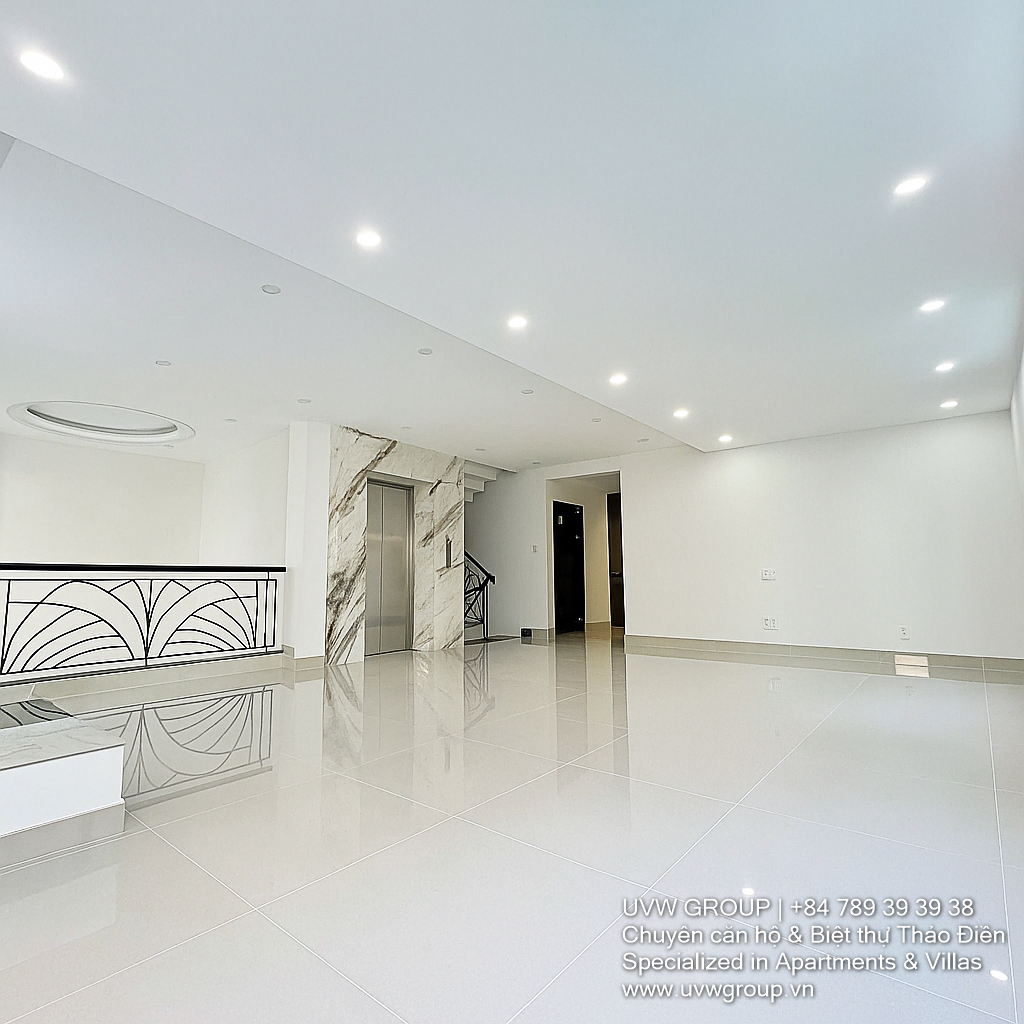 Front view of a modern office house for rent in Song Hanh, An Phu Ward, District 2, featuring 4 floors, large yard, basement, and elevator – ideal for office or business use.