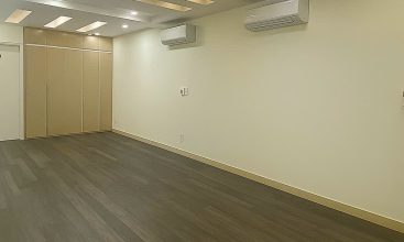 Exterior view of the spacious 6-bedroom house for rent on Street 7, An Phu Ward, Thu Duc City, featuring a rooftop terrace.