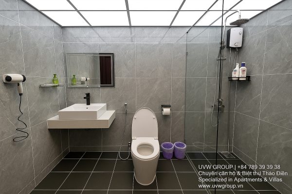 Exterior view of a spacious luxury 7-bedroom villa in Thao Dien, Ho Chi Minh City, featuring a large semi-indoor swimming pool, an elegant living room, a vibrant karaoke lounge with colorful lights, a comfortable king-size bedroom, and modern bathrooms (5 indoor, 3 outdoor).