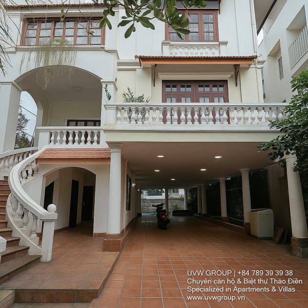 Exterior view of a spacious luxury 7-bedroom villa in Thao Dien, Ho Chi Minh City, featuring a large semi-indoor swimming pool, an elegant living room, a vibrant karaoke lounge with colorful lights, a comfortable king-size bedroom, and modern bathrooms (5 indoor, 3 outdoor).