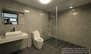 Exterior view of a spacious luxury 7-bedroom villa in Thao Dien, Ho Chi Minh City, featuring a large semi-indoor swimming pool, an elegant living room, a vibrant karaoke lounge with colorful lights, a comfortable king-size bedroom, and modern bathrooms (5 indoor, 3 outdoor).