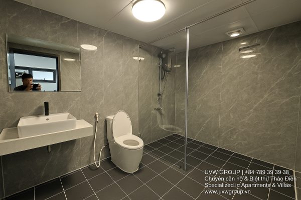Exterior view of a spacious luxury 7-bedroom villa in Thao Dien, Ho Chi Minh City, featuring a large semi-indoor swimming pool, an elegant living room, a vibrant karaoke lounge with colorful lights, a comfortable king-size bedroom, and modern bathrooms (5 indoor, 3 outdoor).