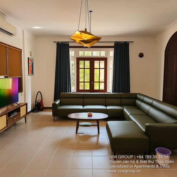 Exterior view of a spacious luxury 7-bedroom villa in Thao Dien, Ho Chi Minh City, featuring a large semi-indoor swimming pool, an elegant living room, a vibrant karaoke lounge with colorful lights, a comfortable king-size bedroom, and modern bathrooms (5 indoor, 3 outdoor).