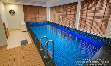Image of a stunning luxury 4-bedroom villa for short-term rent in Ho Chi Minh City, showcasing its private indoor swimming pool and stylish, fully furnished resort-style interiors.