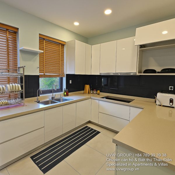 Image of a stunning luxury 4-bedroom villa for short-term rent in Ho Chi Minh City, showcasing its private indoor swimming pool and stylish, fully furnished resort-style interiors.