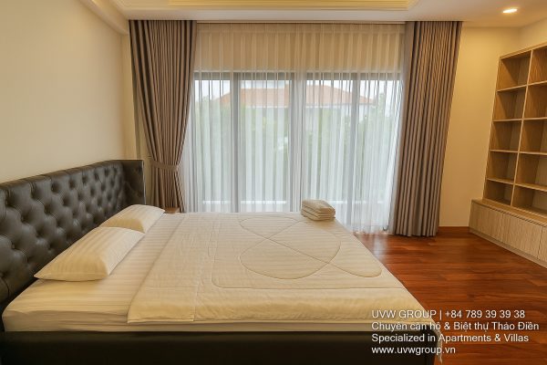 Image of a stunning luxury 4-bedroom villa for short-term rent in Ho Chi Minh City, showcasing its private indoor swimming pool and stylish, fully furnished resort-style interiors.