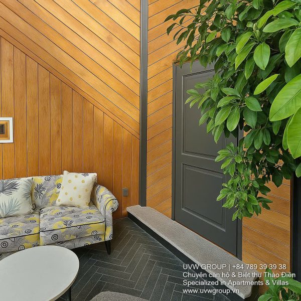 Exterior and interior views of a modern luxury 5-bedroom villa for rent in Thao Dien, Ho Chi Minh City, featuring a unique indoor swimming pool with wooden deck, a stylish living room, a dedicated karaoke room, a king-size bedroom, and 6 contemporary bathrooms (4 indoor, 2 outdoor).