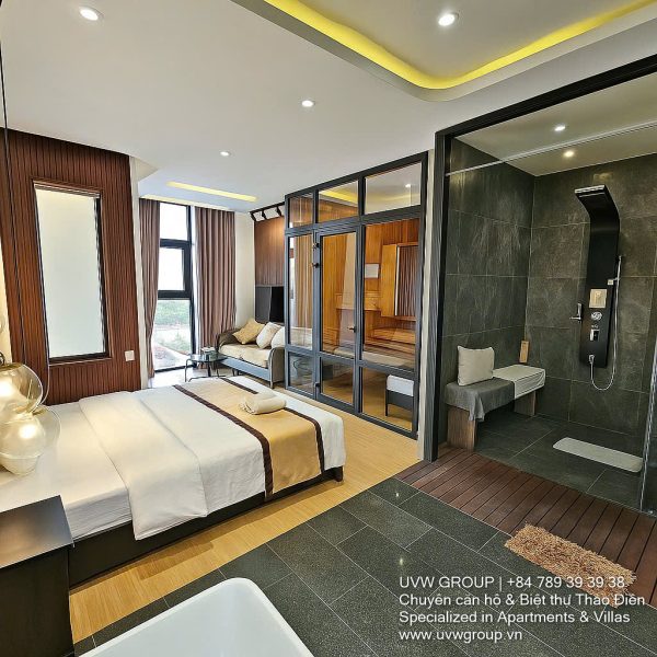 Exterior and interior views of a modern luxury 5-bedroom villa for rent in Thao Dien, Ho Chi Minh City, featuring a unique indoor swimming pool with wooden deck, a stylish living room, a dedicated karaoke room, a king-size bedroom, and 6 contemporary bathrooms (4 indoor, 2 outdoor).