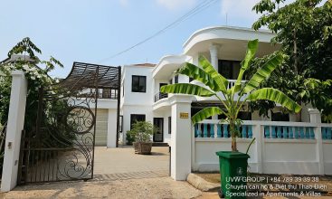 Front view of a 5-bedroom luxury villa with private indoor swimming pool, king-size beds, karaoke room, and modern interiors for short-term rent in Thao Dien, District 2, Ho Chi Minh City.
