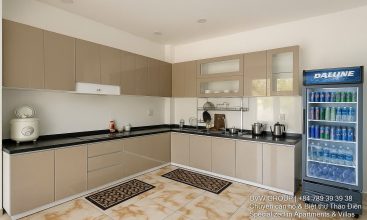 Front view of a 5-bedroom luxury villa with private indoor swimming pool, king-size beds, karaoke room, and modern interiors for short-term rent in Thao Dien, District 2, Ho Chi Minh City.
