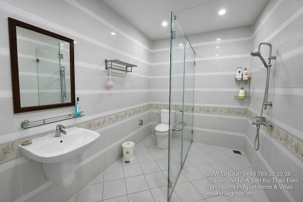 Front view of a 5-bedroom luxury villa with private indoor swimming pool, king-size beds, karaoke room, and modern interiors for short-term rent in Thao Dien, District 2, Ho Chi Minh City.