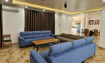 Front view of a 5-bedroom luxury villa with private indoor swimming pool, king-size beds, karaoke room, and modern interiors for short-term rent in Thao Dien, District 2, Ho Chi Minh City.
