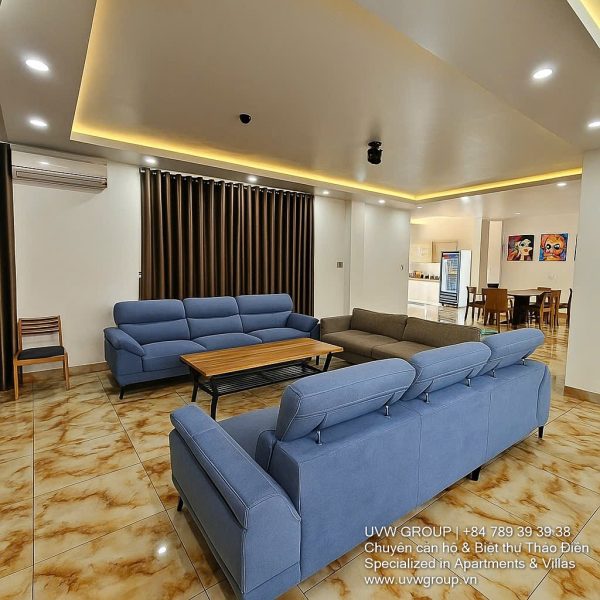 Front view of a 5-bedroom luxury villa with private indoor swimming pool, king-size beds, karaoke room, and modern interiors for short-term rent in Thao Dien, District 2, Ho Chi Minh City.