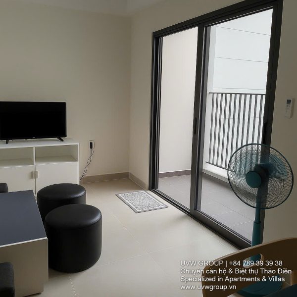 Fully furnished living room with Saigon River view in Masteri Thao Dien 2BR corner apartment for rent, District 2 HCMC.