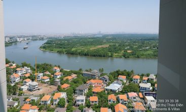 Fully furnished living room with Saigon River view in Masteri Thao Dien 2BR corner apartment for rent, District 2 HCMC.