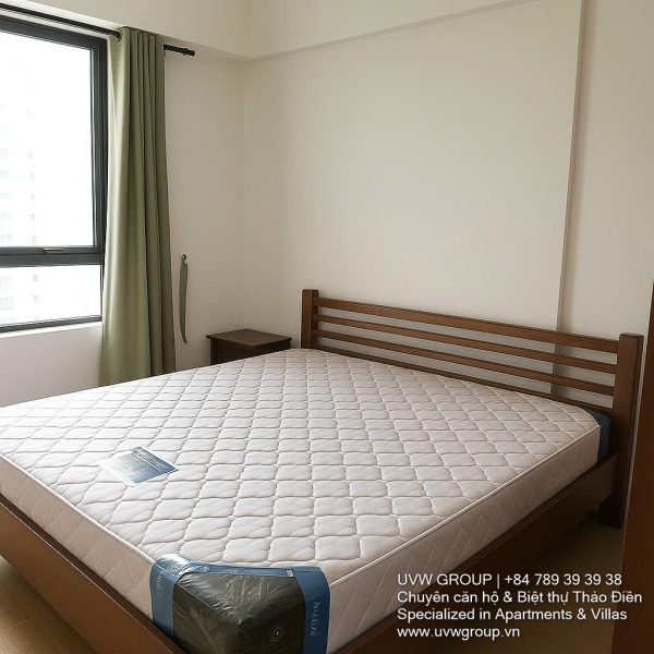 Fully furnished living room with Saigon River view in Masteri Thao Dien 2BR corner apartment for rent, District 2 HCMC.