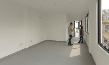 Modern 3-storey office building for rent in Thao Dien with 2 frontages, glass windows, and rooftop terrace