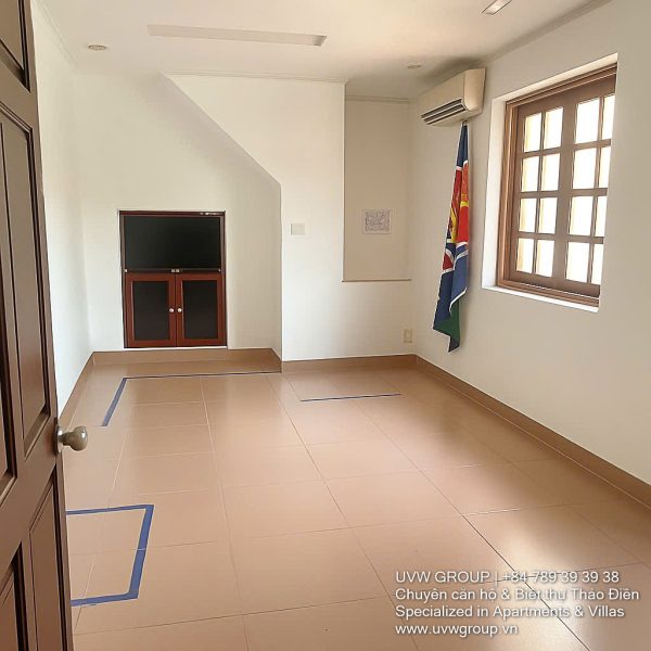 Premium 5-bedroom house with basement and rooftop for rent on Nguyen Qui Canh St, An Phu, HCMC.