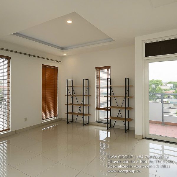 Exterior view of a spacious 3-storey house available for rent in Thao Dien, Ho Chi Minh City, featuring front garden space and traditional tiled roof.
