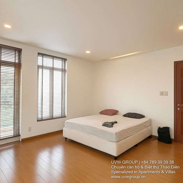 Exterior view of a spacious 3-storey house available for rent in Thao Dien, Ho Chi Minh City, featuring front garden space and traditional tiled roof.