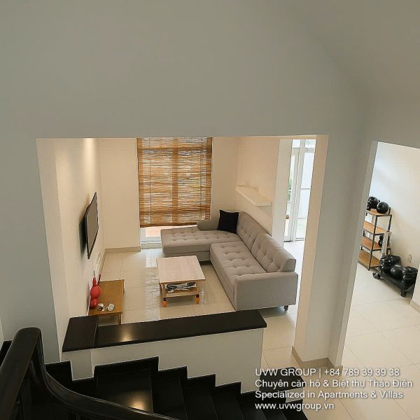 Exterior view of a spacious 3-storey house available for rent in Thao Dien, Ho Chi Minh City, featuring front garden space and traditional tiled roof.
