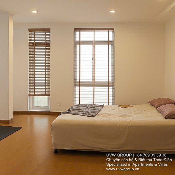 Exterior view of a spacious 3-storey house available for rent in Thao Dien, Ho Chi Minh City, featuring front garden space and traditional tiled roof.